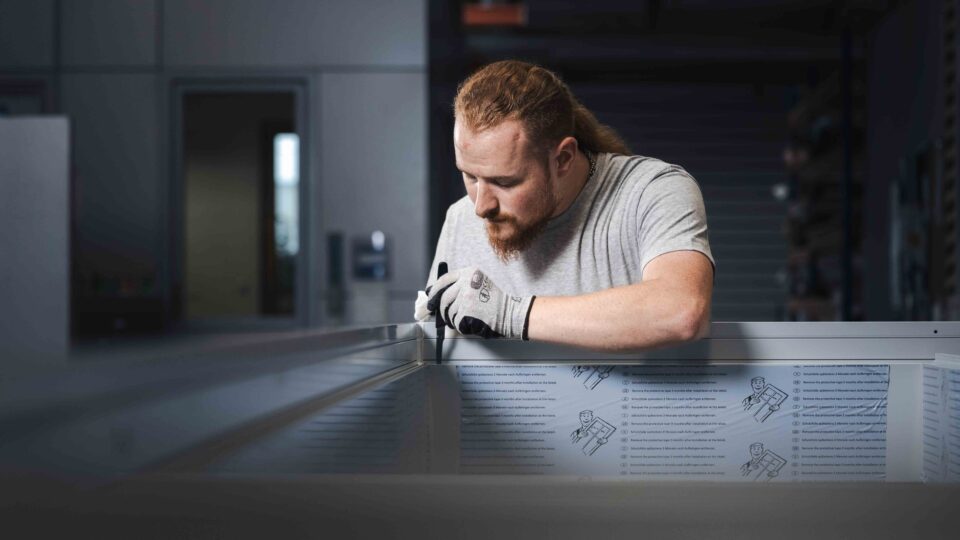 GIG employees in unitized façade production assembling the element frames.