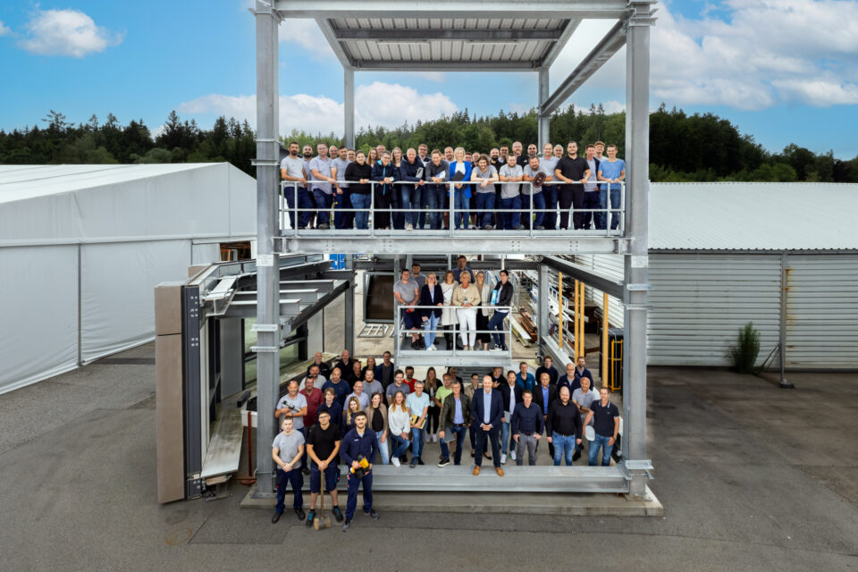 Gruppenfoto GIG-Team vor dem Musterturm.