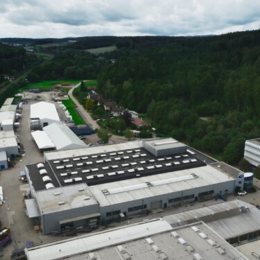 GIG Holding GmbH company premises with office, production, façade testing facility, and storage areas.